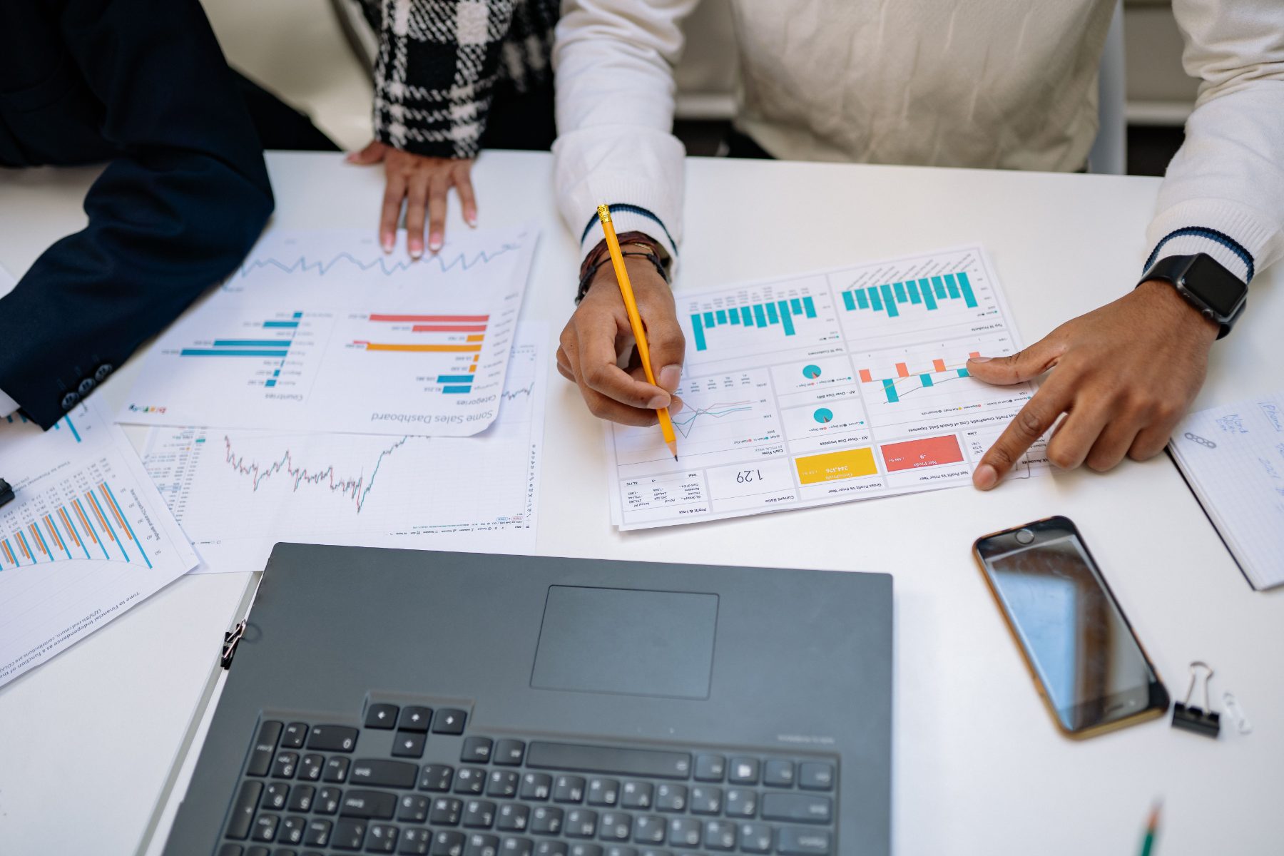 Advisors reviewing management accounts with a client